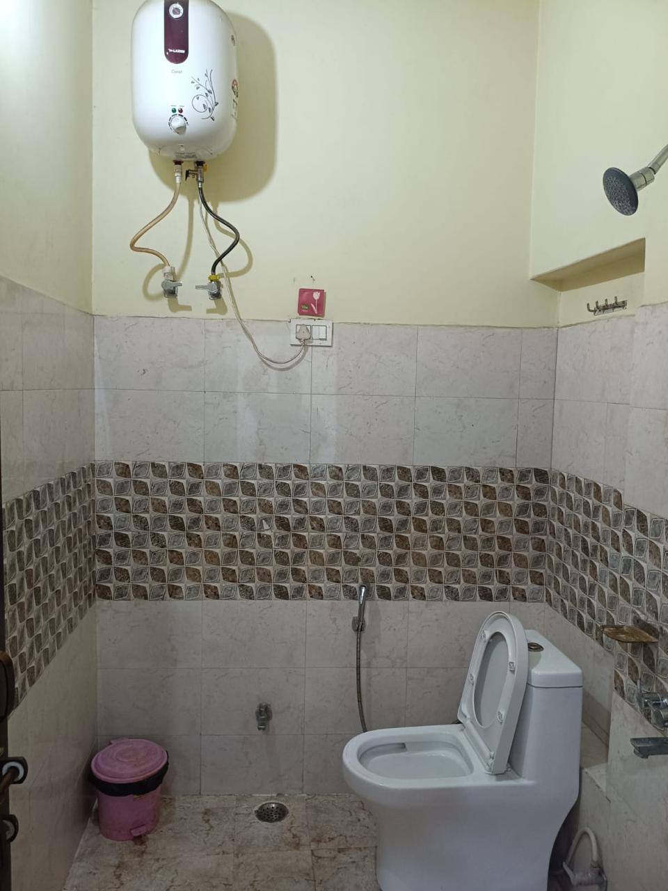 Clean Bathroom with geyser